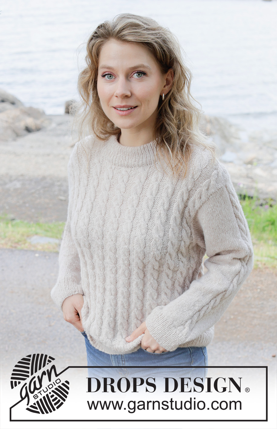 Cable Mirage / DROPS 255-28 - Knitted jumper in DROPS Sky. The piece is worked bottom up with cables. Sizes S - XXXL.