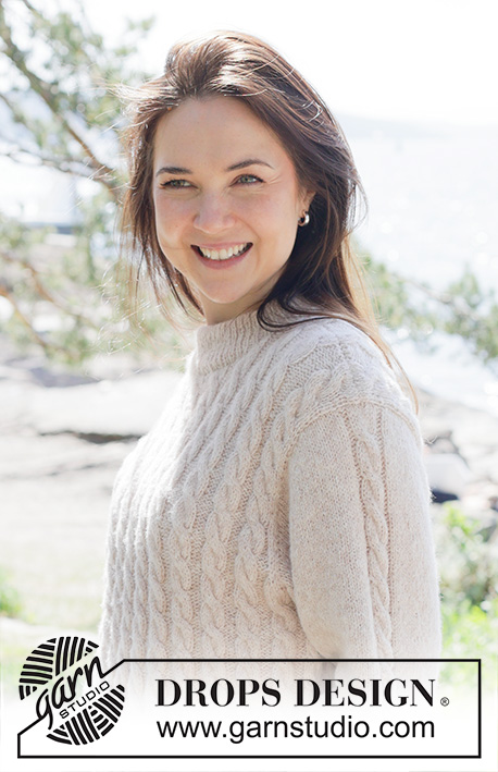 Cable Mirage / DROPS 255-28 - Knitted jumper in DROPS Sky. The piece is worked bottom up with cables. Sizes S - XXXL.