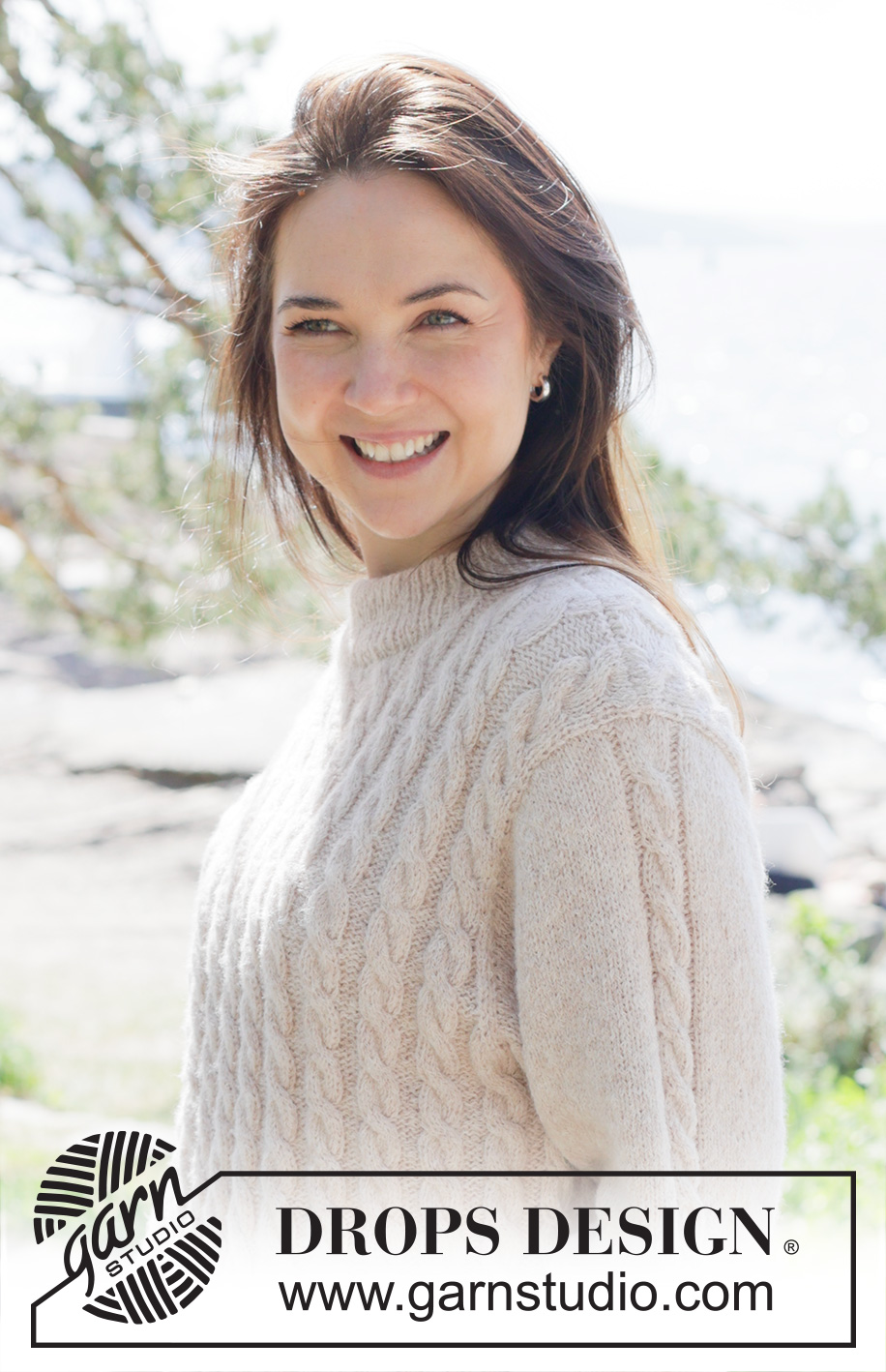 Cable Mirage / DROPS 255-28 - Knitted jumper in DROPS Sky. The piece is worked bottom up with cables. Sizes S - XXXL.