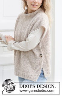 Latte Love Vest / DROPS 255-40 - Gebreide gilet in DROPS Alpaca Bouclé en DROPS Kid-Silk. Het werk wordt van onder naar boven gebreid in tricotsteek met randen in ribbelsteek, PUNNIKRAND en opening in de zijkant. Maat: S - XXXL