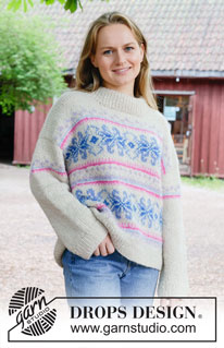 Frozen Bloom / DROPS 255-5 - Knitted over-size jumper in DROPS Air. The piece is worked top down with European/diagonal shoulders, Nordic pattern with stars and double neck. Sizes S - XXXL.