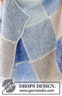 August Evenings Blanket / DROPS 256-1 - 2 DROPS Sky lõngaga kootud doomino ruutudega ja nöörkandiga tekk
