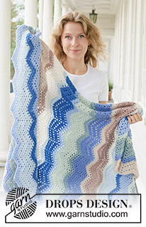 Wind Wish Blanket / DROPS 256-13 - Crocheted blanket in DROPS Air. The piece is worked back and forth, with stripes and lace pattern.