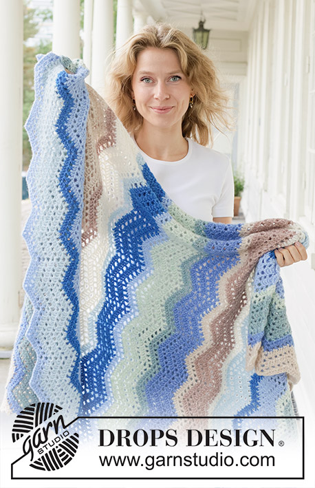 Wind Wish Blanket / DROPS 256-13 - Crocheted blanket in DROPS Air. The piece is worked back and forth, with stripes and lace pattern.