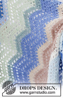 Wind Wish Blanket / DROPS 256-13 - Crocheted blanket in DROPS Air. The piece is worked back and forth, with stripes and lace pattern.