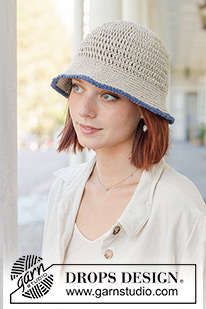 Kiss Me Kate / DROPS 256-7 - Crocheted hat in DROPS Bomull-Lin. The piece is worked top down, with treble and double crochets and an edge of lobster stitch.