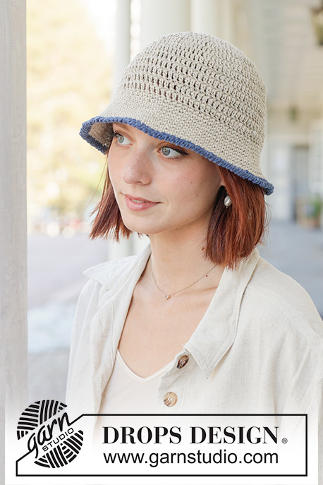 Kiss Me Kate / DROPS 256-7 - Crocheted hat in DROPS Bomull-Lin. The piece is worked top down, with treble and double crochets and an edge of lobster stitch.