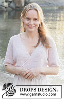 New Dawn Wrap / DROPS 257-5 - Knitted wrap-over jacket with short sleeves in DROPS Cotton Merino. The piece is worked bottom up with stocking stitch V-neck and I-cord. Sizes S - XXXL.