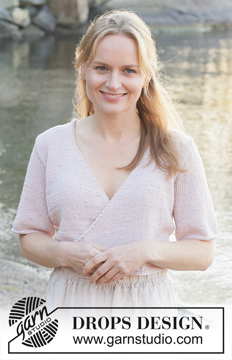 New Dawn Wrap / DROPS 257-5 - Knitted wrap-over jacket with short sleeves in DROPS Cotton Merino. The piece is worked bottom up with stocking stitch V-neck and I-cord. Sizes S - XXXL.