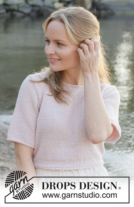 New Dawn / DROPS 257-6 - Knitted jumper with short sleeves in DROPS Cotton Merino. The piece is worked bottom up with stocking stitch and I-cord. Sizes S - XXXL.