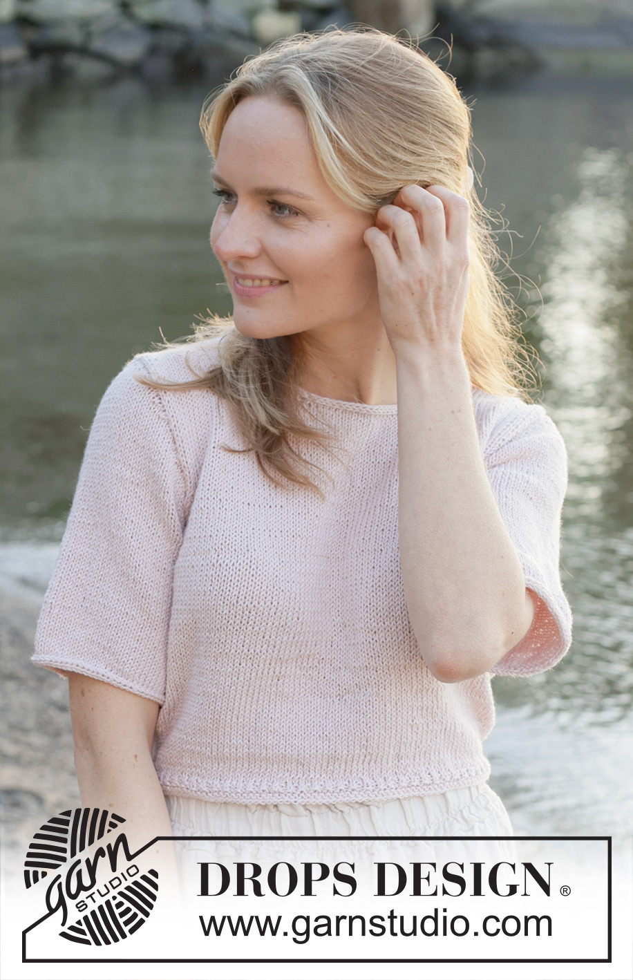 New Dawn / DROPS 257-6 - Knitted jumper with short sleeves in DROPS Cotton Merino. The piece is worked bottom up with stocking stitch and I-cord. Sizes S - XXXL.