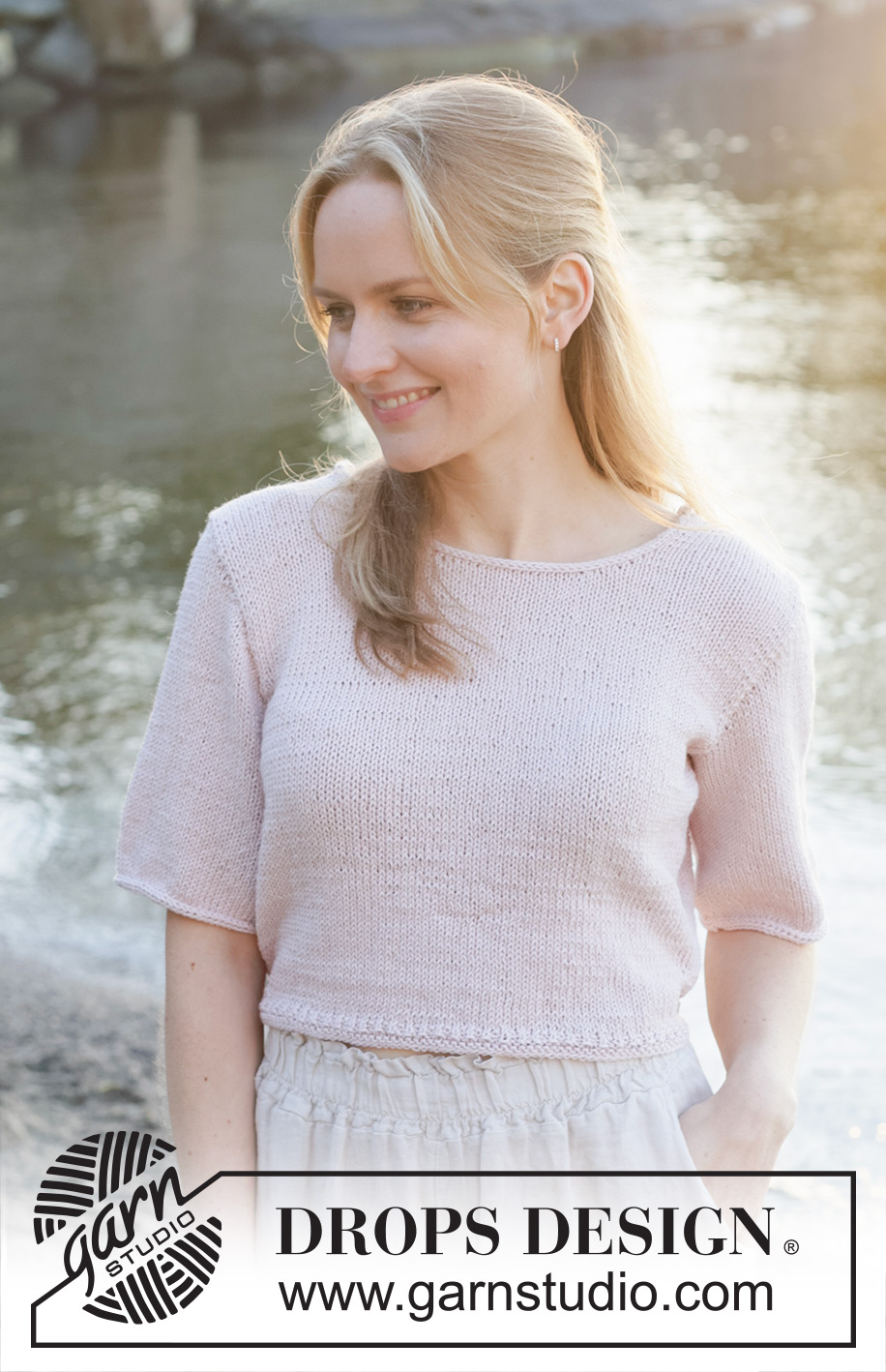 New Dawn / DROPS 257-6 - Knitted jumper with short sleeves in DROPS Cotton Merino. The piece is worked bottom up with stocking stitch and I-cord. Sizes S - XXXL.