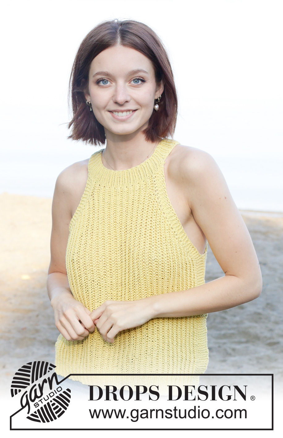Sunbeam Shine Top / DROPS 258-19 - Strikket topp i DROPS Cotton Light. Arbeidet strikkes ovenfra og ned med halterneck og helpatent. Størrelse XS - XXL.