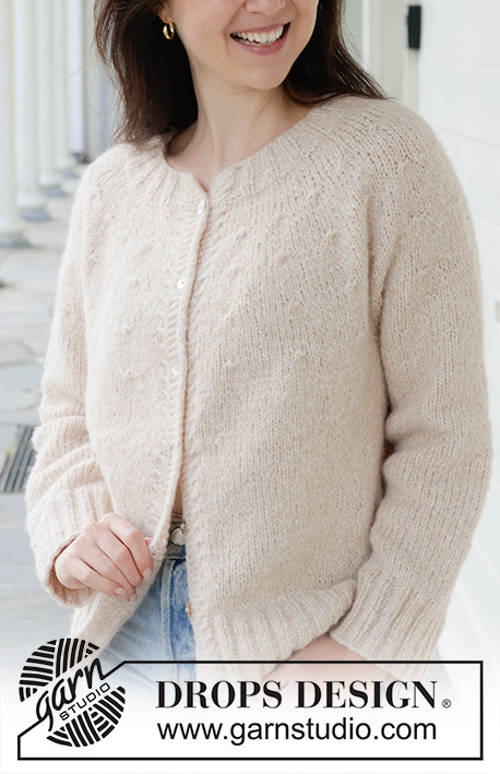 Whispering Sands Cardigan / DROPS 258-31 - Knitted jacket in DROPS Air. The piece is worked top down in stocking stitch with round yoke, small cables and I-cord. Sizes S - XXXL.
