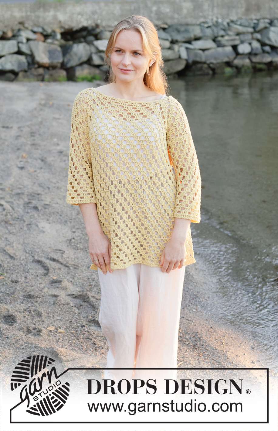 Sunny Isles / DROPS 258-36 - Crocheted long jumper in DROPS Belle. The piece is worked bottom up with lace pattern, boat-neck and ¾-length sleeves. Sizes S - XXXL.