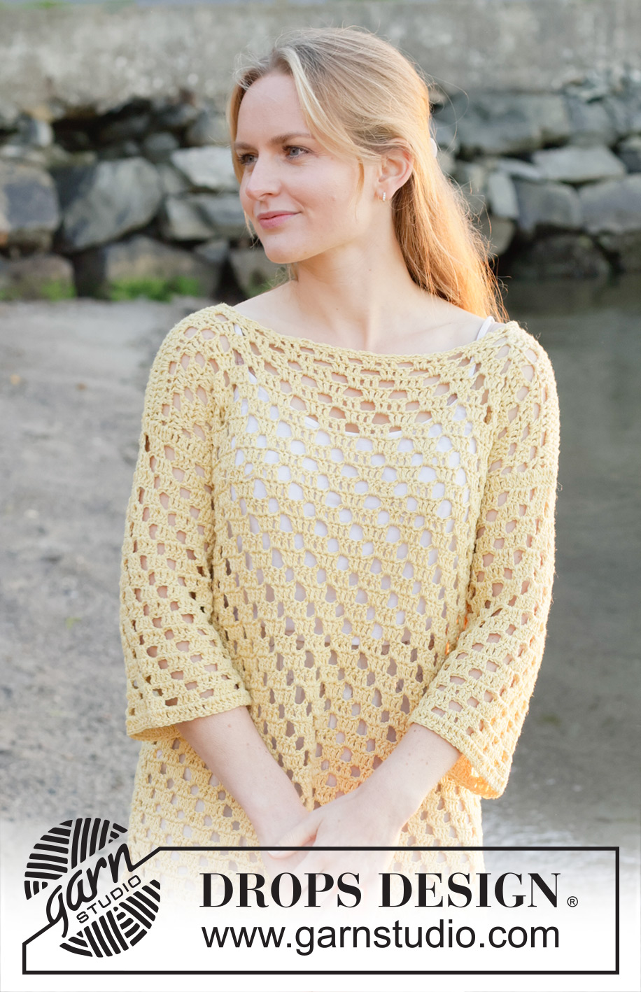 Sunny Isles / DROPS 258-36 - Crocheted long jumper in DROPS Belle. The piece is worked bottom up with lace pattern, boat-neck and ¾-length sleeves. Sizes S - XXXL.
