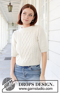 April Snow / DROPS 259-1 - Knitted jumper in DROPS Daisy or DROPS Merino Extra Fine. Piece is knitted bottom up with cables, short sleeves and double neck edge. Size: S - XXXL.
