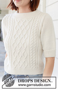April Snow / DROPS 259-1 - Knitted jumper in DROPS Daisy or DROPS Merino Extra Fine. Piece is knitted bottom up with cables, short sleeves and double neck edge. Size: S - XXXL.