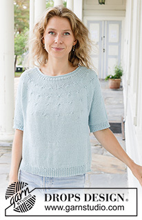 Beaded Sky / DROPS 259-25 - Gestrickter Pullover mit kurzen Ärmeln in DROPS Paris. Die Arbeit wird von oben nach unten glatt rechts mit Rundpasse und Rollrand gestrickt. Größe S - XXXL.