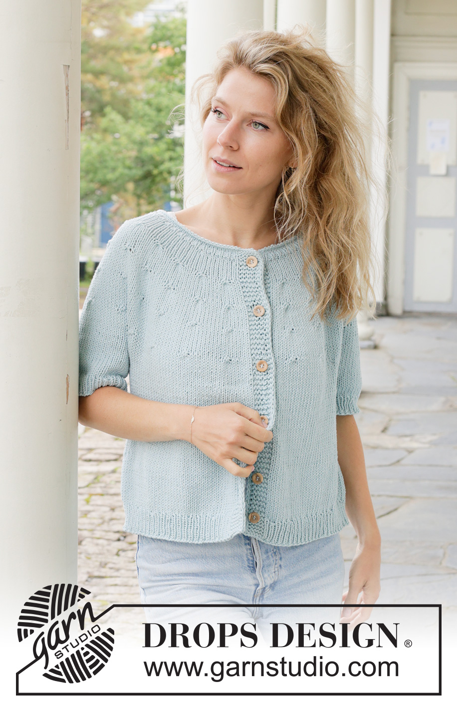 Beaded Sky Cardigan / DROPS 259-26 - Knitted jacket with short sleeves in DROPS Paris. The piece is worked top down with stocking stitch, round yoke, rolled neck and I-cord. Sizes S - XXXL.