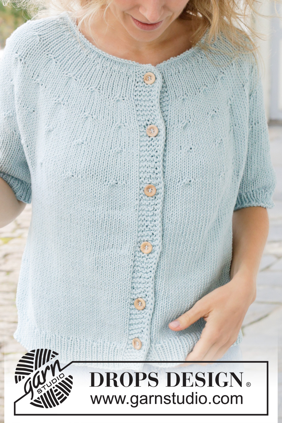 Beaded Sky Cardigan / DROPS 259-26 - Knitted jacket with short sleeves in DROPS Paris. The piece is worked top down with stocking stitch, round yoke, rolled neck and I-cord. Sizes S - XXXL.