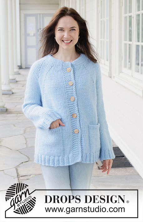 Blue Bliss Cardigan / DROPS 259-37 - Knitted long oversized jacket in DROPS Snow. Piece is knitted top down in stocking stitch with double neck edge, raglan, pockets and I-cord. Size XS – XXXL.