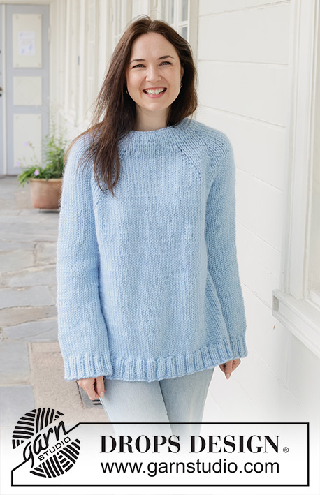 Blue Bliss Sweater / DROPS 259-38 - Knitted long oversized jumper in DROPS Snow. Piece is knitted top down in stocking stitch with double neck edge and raglan. Size XS – XXXL.