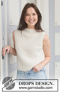 Rising Cloud / DROPS 259-42 - Knitted top in DROPS Alpaca Bouclé. The piece is worked top down with stocking stitch, shoulder increases, boat neck and I-cord. Sizes S - XXXL.