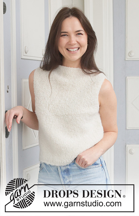 Rising Cloud / DROPS 259-42 - Knitted top in DROPS Alpaca Bouclé. The piece is worked top down with stocking stitch, shoulder increases, boat neck and I-cord. Sizes S - XXXL.