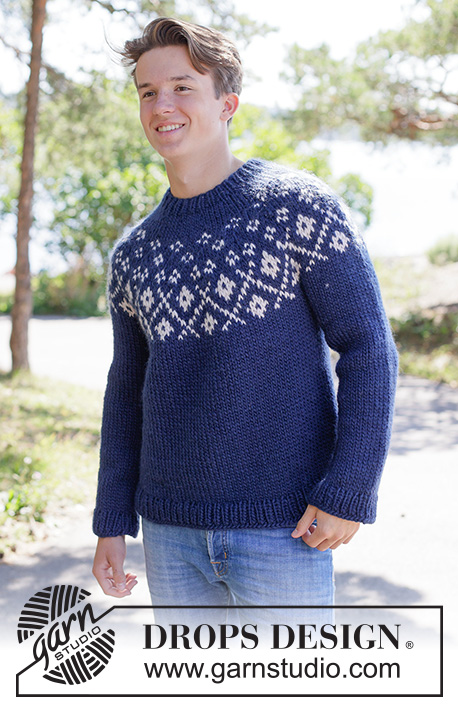 Midnight Flowers Sweater / DROPS 260-20 - Knitted sweater for men in DROPS Snow. Piece is knitted top down with round yoke and multi-colored pattern. Size XS – XXXL.