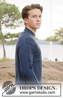 Stormy Coast Sweater / DROPS 260-35 - Stickad tröja till herr i DROPS DROPS Merino Extra Fine. Arbetet stickas uppifrån och ner i slätstickning med europeisk axel / sned axel. Storlek S - XXXL.