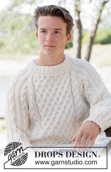 Ireland Magic Sweater / DROPS 260-4 - Knitted sweater in DROPS Alaska or DROPS Big Merino. Piece is knitted top down with raglan, cables, relief pattern and double neck edge. Size XS – XXXL.
