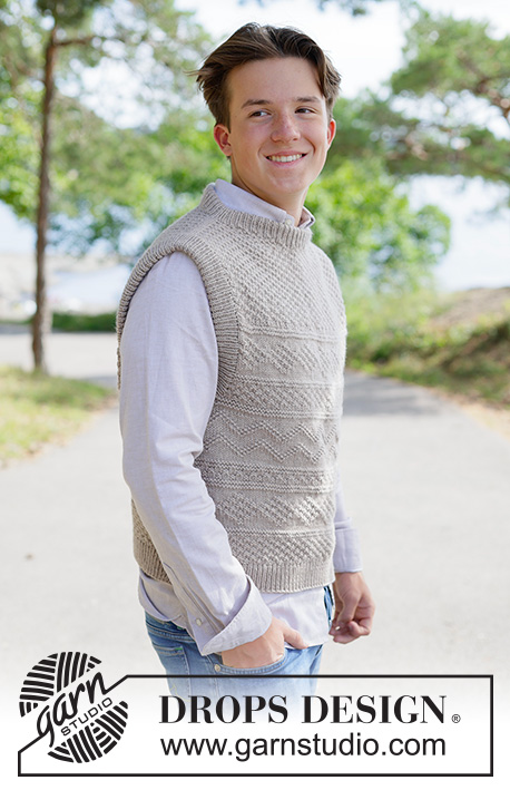 Winds of Winter Vest / DROPS 260-5 - Strikket vest til herre i DROPS Karisma eller DROPS Merino Extra Fine. Arbeidet strikkes ovenfra og ned med skrå skulder, relieffmønster og rund hals. Størrelse XS – XXL.