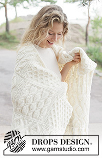 Aran Hug Blanket / DROPS 261-1 - Knitted blanket in DROPS Nepal. Piece is knitted in squares with cables.
