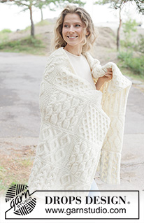 Aran Hug Blanket / DROPS 261-1 - Knitted blanket in DROPS Nepal. Piece is knitted in squares with cables.