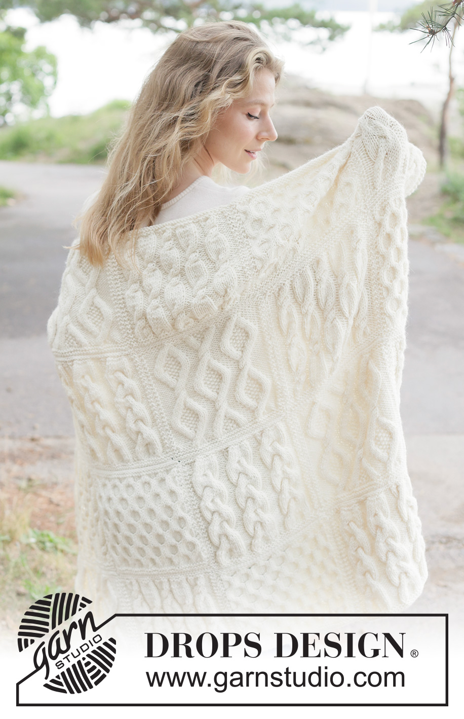 Aran Hug Blanket / DROPS 261-1 - Knitted blanket in DROPS Nepal. Piece is knitted in squares with cables.
