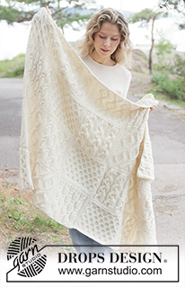 Aran Hug Blanket / DROPS 261-1 - Knitted blanket in DROPS Nepal. Piece is knitted in squares with cables.