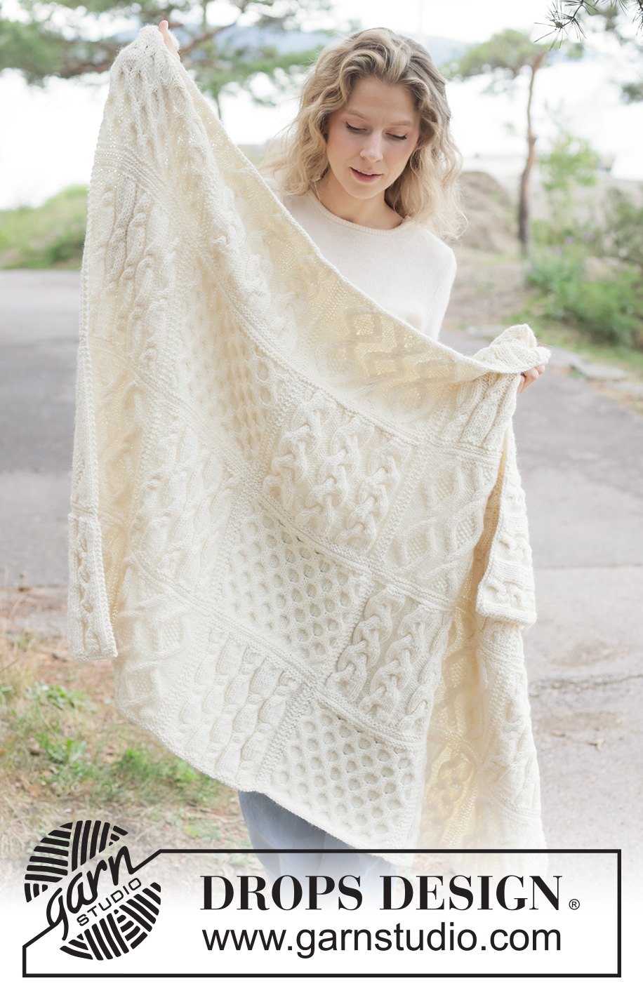 Aran Hug Blanket / DROPS 261-1 - Knitted blanket in DROPS Nepal. Piece is knitted in squares with cables.
