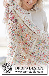 Wildflower Bloom Blanket / DROPS 261-2 - Crocheted blanket in DROPS Fiesta. The piece is worked in Granny squares, which are then worked together.