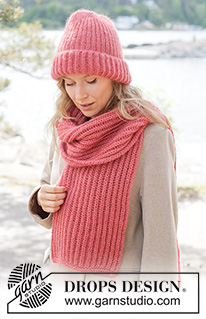 Cherry Fluff Set / DROPS 261-24 - Gebreide muts en sjaal in 1 draad DROPS Nord en 2 draden DROPS Kid-Silk, of 1 draad DROPS Alpaca en 2 draden DROPS Kid-Silk. Het werk wordt in Engelse patentsteek en boordsteek gebreid.