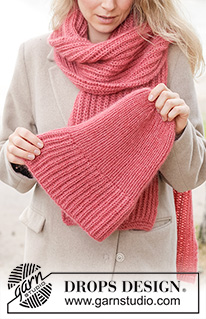 Cherry Fluff Set / DROPS 261-24 - Gebreide muts en sjaal in 1 draad DROPS Nord en 2 draden DROPS Kid-Silk, of 1 draad DROPS Alpaca en 2 draden DROPS Kid-Silk. Het werk wordt in Engelse patentsteek en boordsteek gebreid.