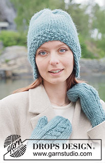 Tidebound Twist Hat / DROPS 261-44 - Gebreide muts met oorflappen in DROPS Snow. Het werk wordt van onder naar boven gebreid met dubbele gerstekorrel en tricotsteek.