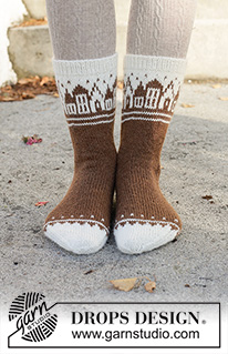 Frosty Town Socks / DROPS 261-72 - Strikkede sokker i DROPS Nord. Arbejdet strikkes oppefra og ned i glatstrik med nordisk mønster og hus. Størrelse 35 - 43. Tema: Jul.