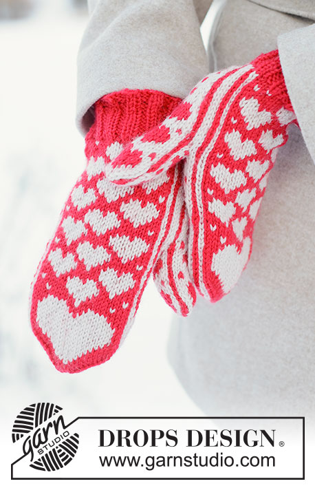 Heartwarming Mittens / DROPS 261-75 - Rękawiczki na drutach z włóczki DROPS Karisma. Przerabiane od czubka palców do mankietu, z żakardem norweskim w serca. Temat: Walentynki