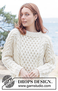 Ireland Magic Sweater / DROPS 262-12 - Knitted jumper in DROPS Alaska or DROPS Big Merino. The piece is worked top down with raglan, cables, relief-pattern and double neck. Sizes XS - XXXL.