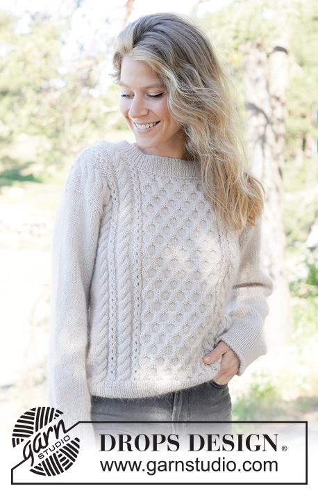 Snow Hive Sweater / DROPS 262-32 - Knitted jumper in DROPS Nord and DROPS Kid-Silk or DROPS Alpaca and DROPS Kid-Silk. The piece is worked bottom up with honeycomb pattern and cables. Sizes XS - XXXL.