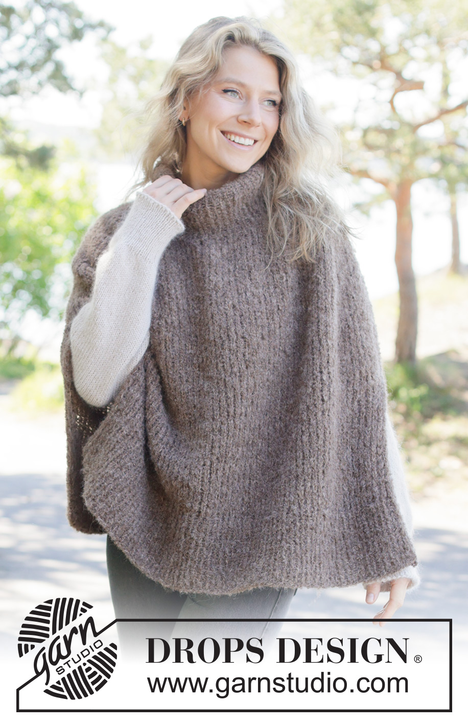 Sheltering Cloud Poncho / DROPS 262-33 - Knitted poncho in 1 strand DROPS Alpaca Bouclé and 1 strand DROPS Brushed Alpaca Silk. The piece is worked top down in stocking stitch with saddle-shoulders, split in sides and I-cord. Sizes XS - XXXL.
