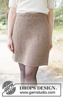Chestnut Whim Skirt / DROPS 262-36 - Knitted knee-length skirt in DROPS Soft Tweed. The piece is worked top down in stocking stitch. Sizes XS - XXXL.