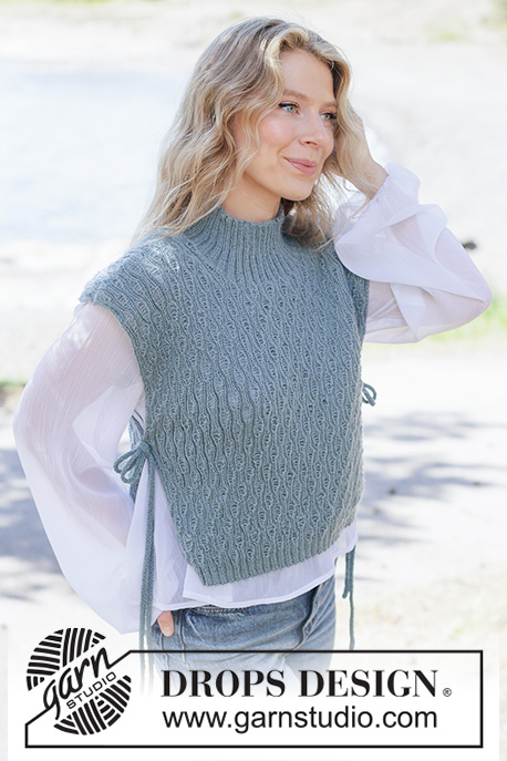 Sea Lace Vest / DROPS 263-18 - Gilet lavorato ai ferri in DROPS Alpaca. Lavorato dall’alto in basso con motivo in rilievo, collo alto e cordini ad I-cord. Taglie: XS - XXXL.