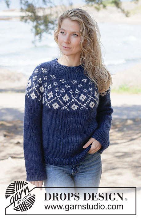 Midnight Flowers Sweater / DROPS 263-2 - Gebreide trui in DROPS Snow. Het werk wordt van boven naar beneden gebreid met ronde pas en gekleurd patroon. Maten XS - XXXL.
